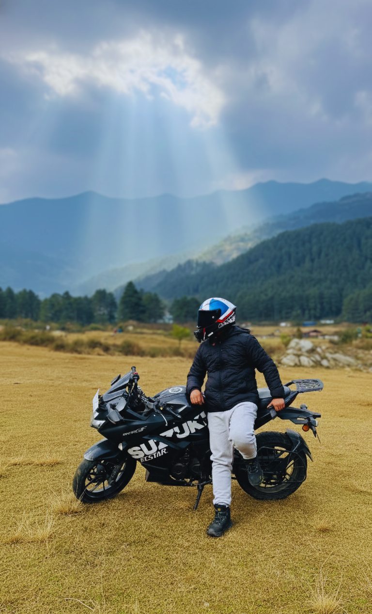 Ravi with his Suzuki motorcycle beneath sunbeams in Jiri